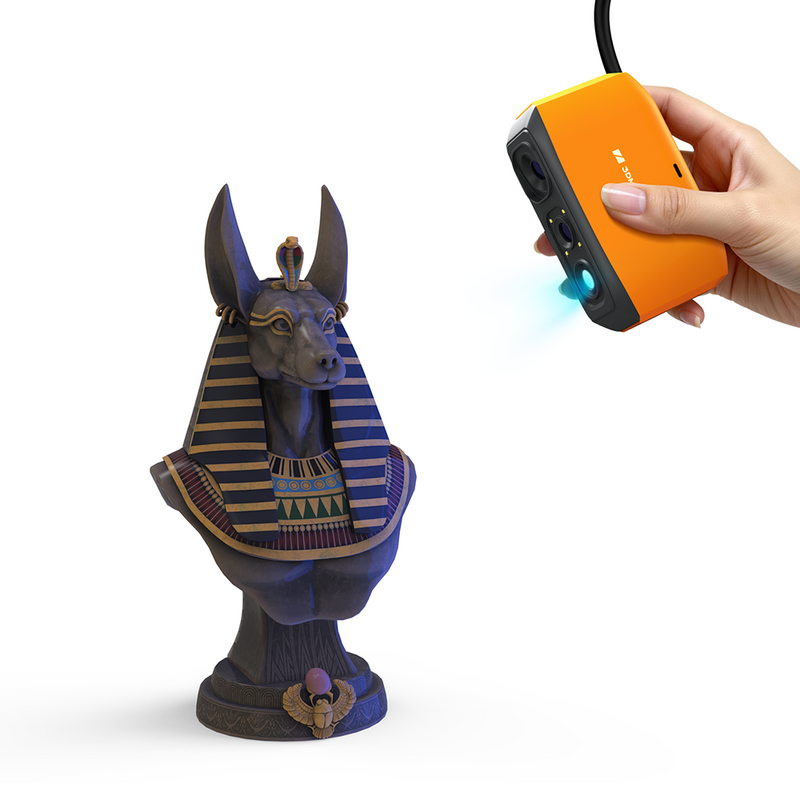 3DMakerpro EU Fox 3D Scanner used handheld, utilizing its NIR light source to scan a dark matte Anubis bust.